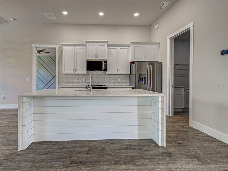 Spacious, unfurnished interior of a new home in , Port Charlotte (Image 58).