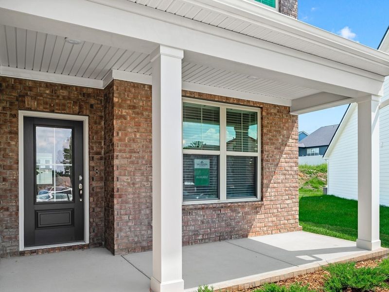 Exterior details and patio area of a home in Woods Crossing, Gallatin (Image 3).