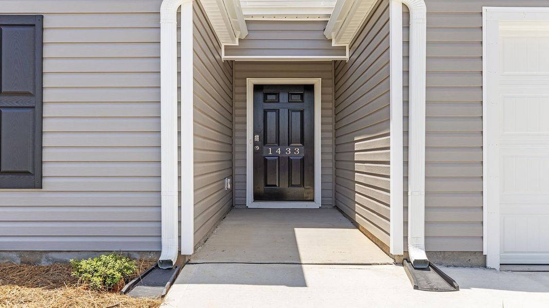 Exterior details and patio area of a home in Treemont Commons, Wellford (Image 3). Exterior details and patio area of a home in Treemont Commons, Wellford (Image 3).