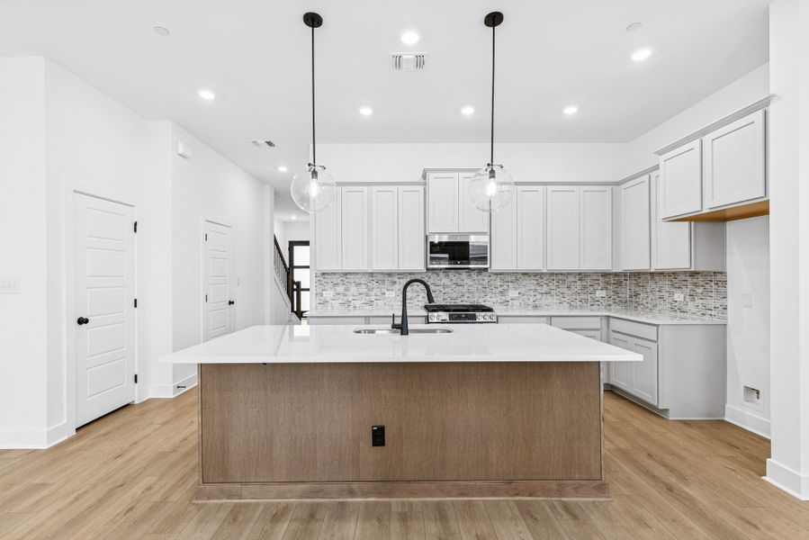 Furnished interior view inside a new home in Double Creek Crossing, Round Rock (Image 6). Furnished interior view inside a new home in Double Creek Crossing, Round Rock (Image 6).