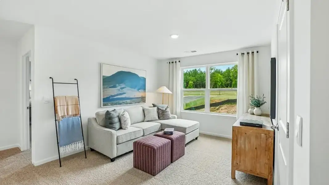 Representative furnished interior of a home built from the Hayden by D.R. Horton in Copper Run South Single Family, Durham (Image 11).