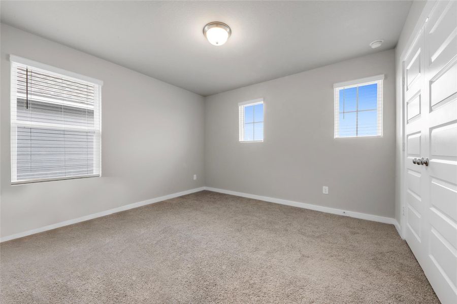 Comfortable secondary bedrooms offering versatility for family members, guests, home office, or hobby spaces. Each room is well-sized and designed with comfort in mind.