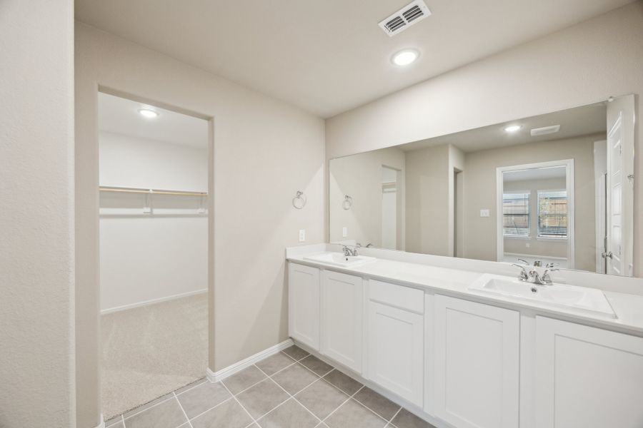 Primary Bathroom in the Harper home plan by Trophy Signature Homes – REPRESENTATIVE PHOTO