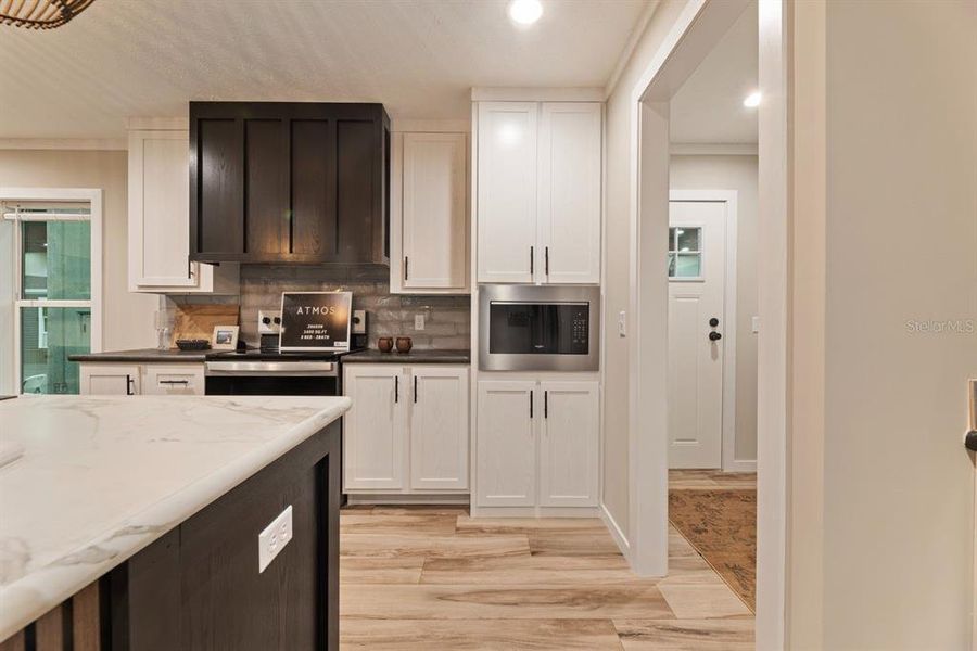 Furnished interior view inside a new home in , Okeechobee (Image 8).