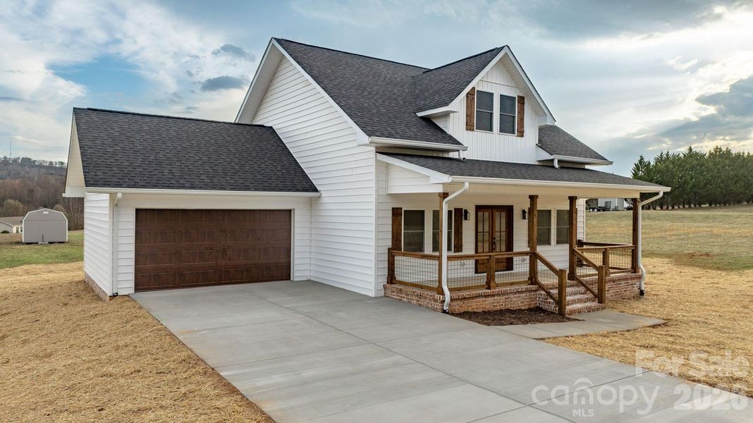 Front exterior of a new home in , Taylorsville, NC, highlighting curb appeal (Image 18). Front exterior of a new home in , Taylorsville, NC, highlighting curb appeal (Image 18).