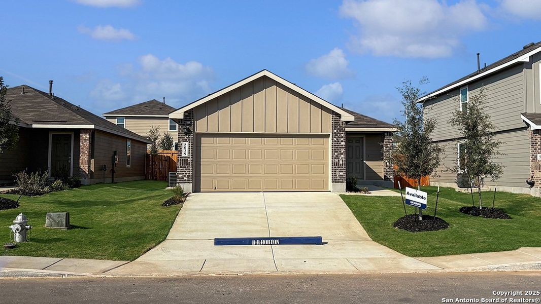 Front exterior of a new home in Langdon, San Antonio, TX, highlighting curb appeal (Image 21). Front exterior of a new home in Langdon, San Antonio, TX, highlighting curb appeal (Image 21).