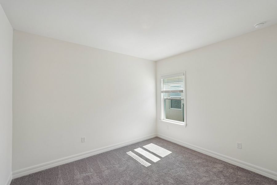 Spacious, unfurnished interior of a new home in Heritage Station, Punta Gorda (Image 52).