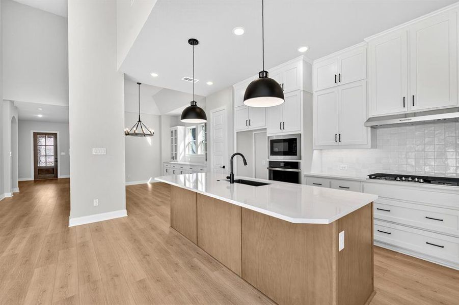 Furnished interior view inside a new home in Pecan Square - Gardens, Northlake (Image 5). Furnished interior view inside a new home in Pecan Square - Gardens, Northlake (Image 5).