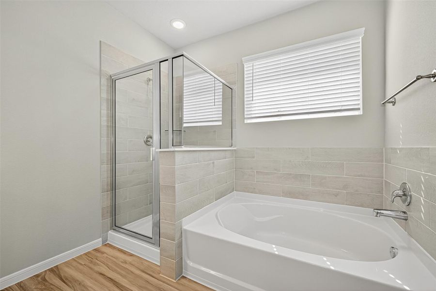 Furnished interior view inside a new home in Sunterra, Katy (Image 8).