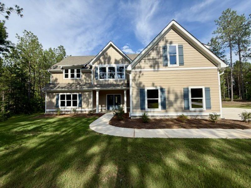 Front exterior of a new home in Dove Creek, LaGrange, GA, highlighting curb appeal (Image 1). Front exterior of a new home in Dove Creek, LaGrange, GA, highlighting curb appeal (Image 1).