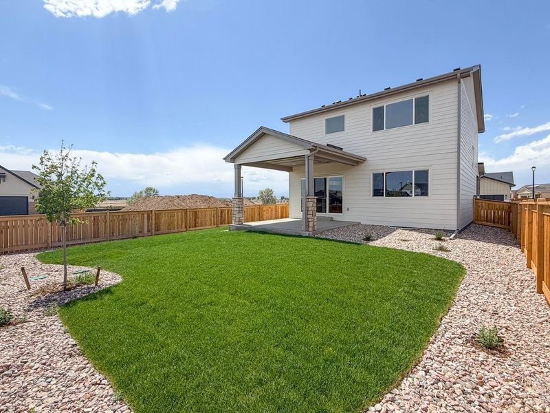 Exterior details and patio area of a home in Greenspire At Windsor Lake, Windsor (Image 3).