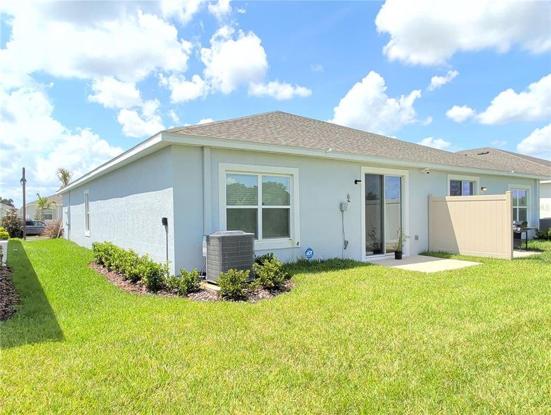 Exterior details and patio area of a home in Farm at Varrea Villas, Plant City (Image 18).