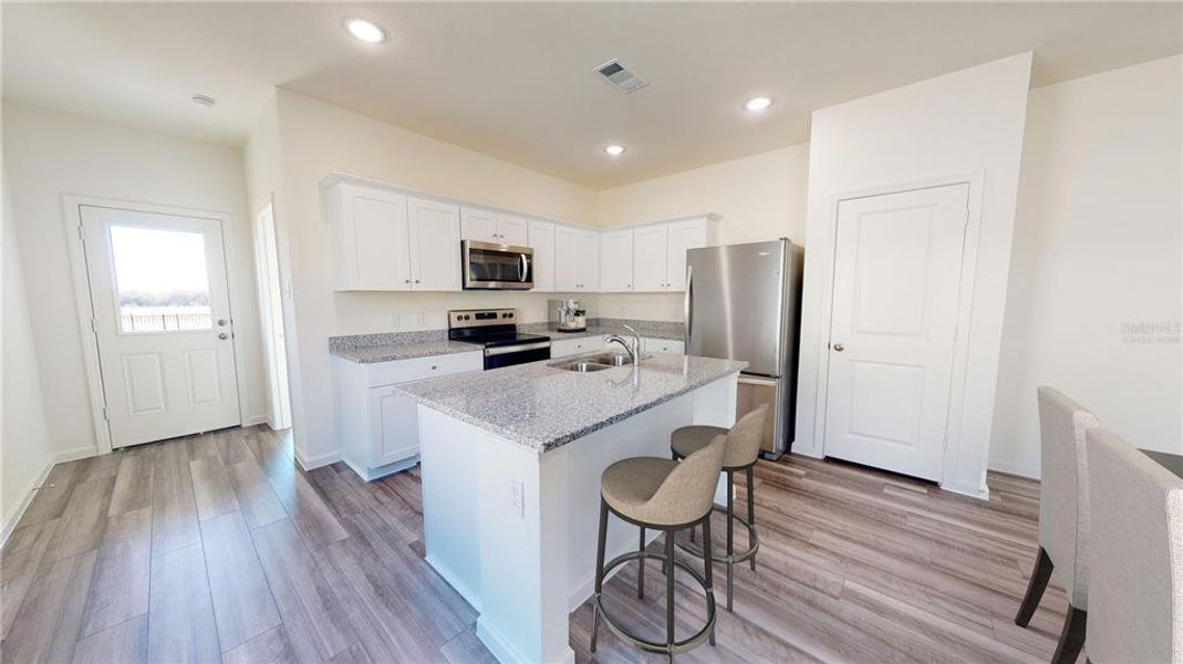 Furnished interior view inside a new home in , Deland (Image 5).