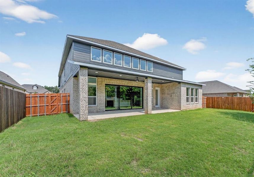 Front exterior of a new home in Legacy Estates, Mansfield, TX, highlighting curb appeal (Image 15). Front exterior of a new home in Legacy Estates, Mansfield, TX, highlighting curb appeal (Image 15).