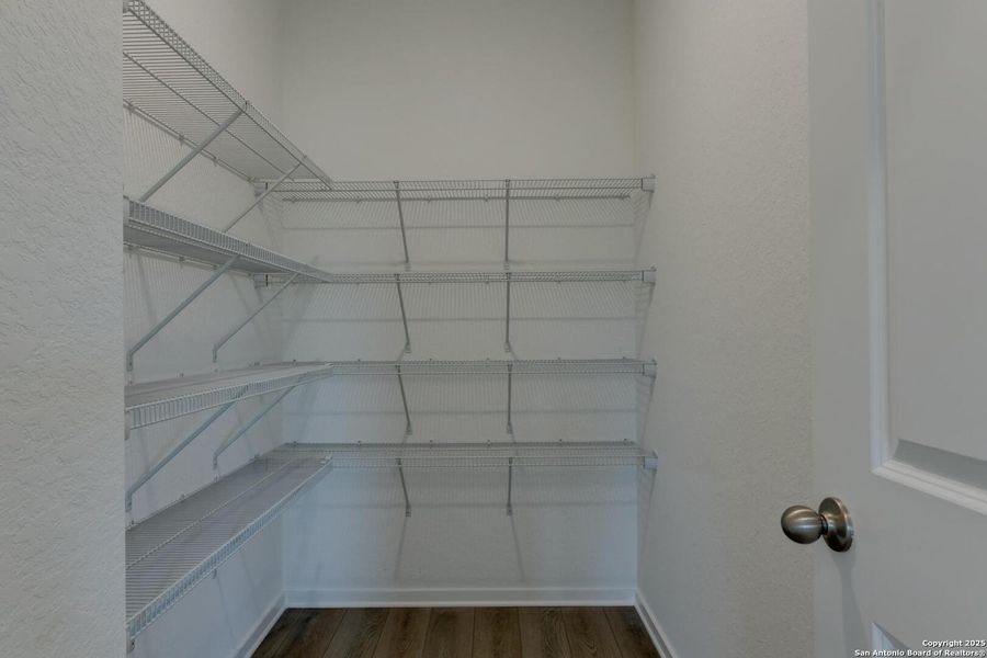 Spacious, unfurnished interior of a new home in Meadows at Hennersby Hollow 40's, San Antonio (Image 24).