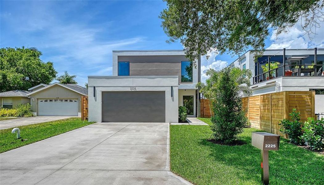 Front exterior of a new home in , Sarasota, FL, highlighting curb appeal (Image 26).