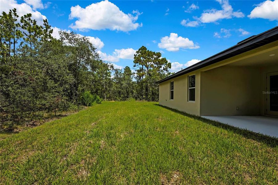 Front exterior of a new home in , Brooksville, FL, highlighting curb appeal (Image 25).
