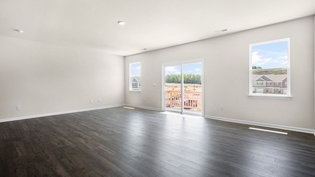 Spacious, unfurnished interior of a new home in The Townes at Madden West, Fuquay Varina (Image 12).