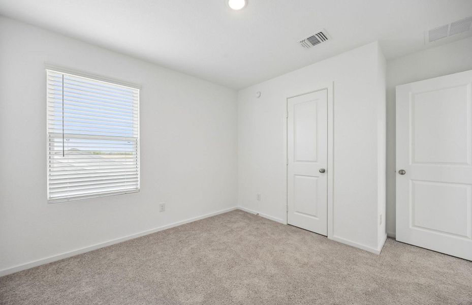 Spacious, unfurnished interior of a new home in The Courtyards at Stokesbury, Waller (Image 25).