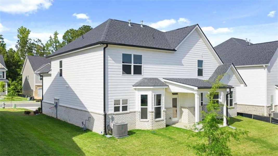 Exterior details and patio area of a home in Wildwood, Covington (Image 28).