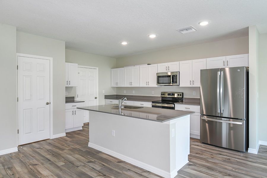 Furnished interior view inside a new home in Scenic Terrace, Haines City (Image 5).