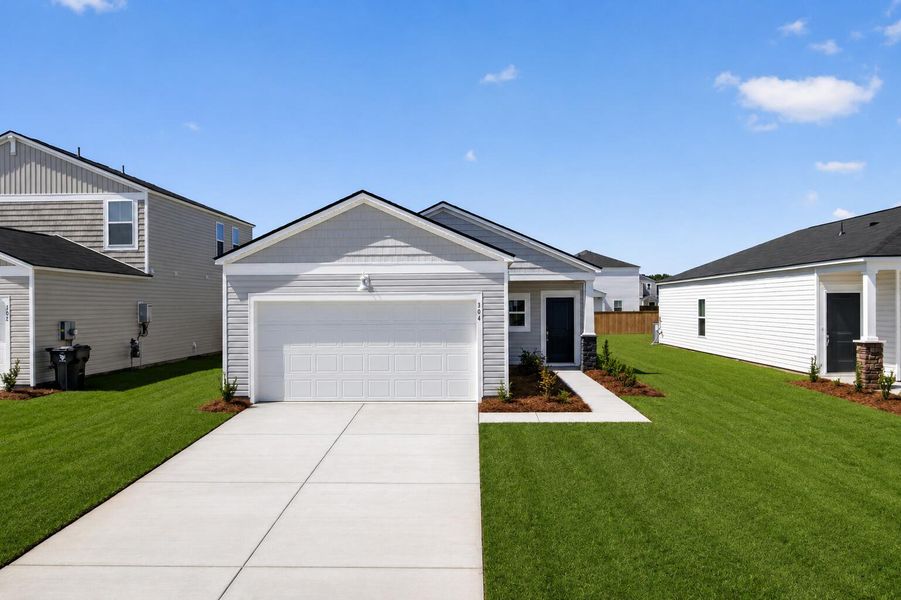 Front exterior of a new home in Lindera Preserve at Cane Bay Plantation, Summerville, SC, highlighting curb appeal (Image 2). Front exterior of a new home in Lindera Preserve at Cane Bay Plantation, Summerville, SC, highlighting curb appeal (Image 2).