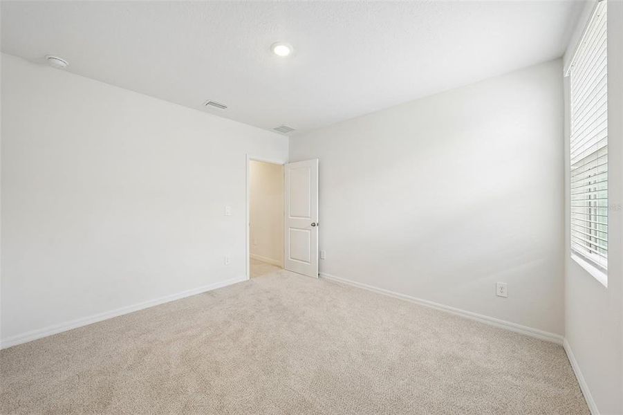Spacious, unfurnished interior of a new home in Pine Ridge Meadows, Hudson (Image 24).