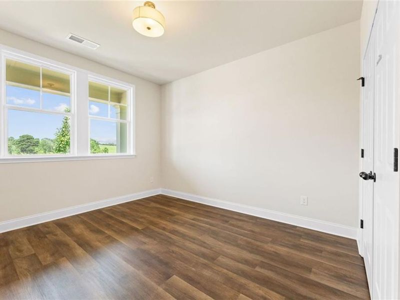 Spacious, unfurnished interior of a new home in Wehunt Meadows, Hoschton (Image 15).