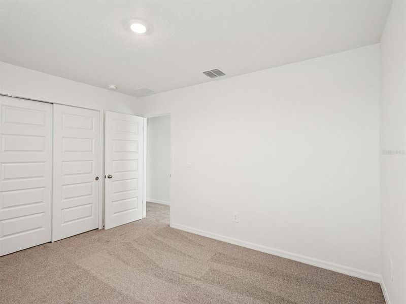 Spacious, unfurnished interior of a new home in Coasterra - Premier Series, Palmetto (Image 28).