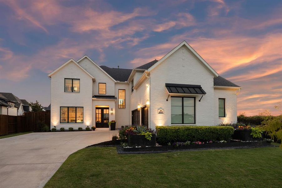 Front exterior of a new home in , Prosper, TX, highlighting curb appeal (Image 1). Front exterior of a new home in , Prosper, TX, highlighting curb appeal (Image 1).