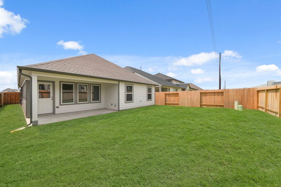 Front exterior of a new home in Morton Creek Ranch, Katy, TX, highlighting curb appeal (Image 17).