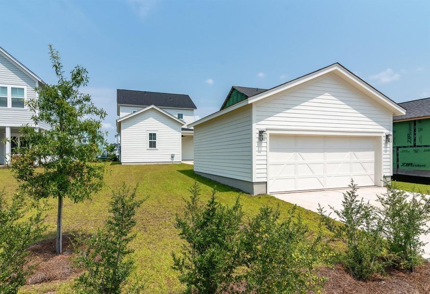 Front exterior of a new home in Nexton, Summerville, SC, highlighting curb appeal (Image 25).