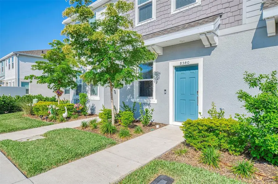 Exterior details and patio area of a home in , Sarasota (Image 3).