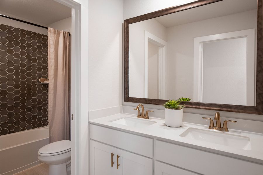 Representative furnished interior of a home built from the Sage by Tri Pointe Homes in The Retreat at Harvest, Argyle (Image 16).