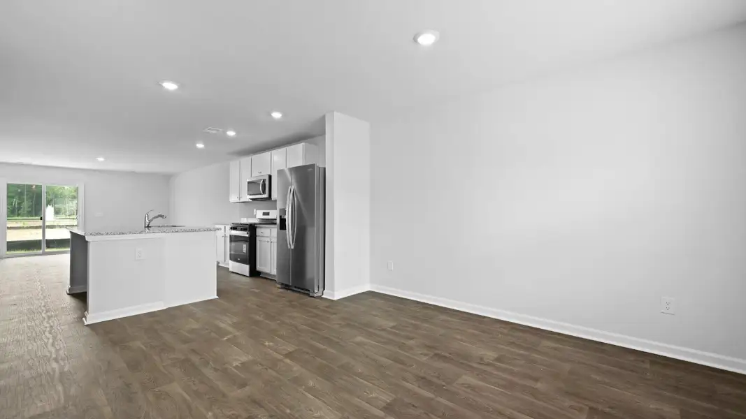 Spacious, unfurnished interior of a new home in Pine Hills Townhomes at Cane Bay, Summerville (Image 17). Spacious, unfurnished interior of a new home in Pine Hills Townhomes at Cane Bay, Summerville (Image 17).