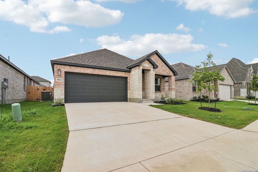 Front exterior of a new home in Kallison Ranch, San Antonio, TX, highlighting curb appeal (Image 25).