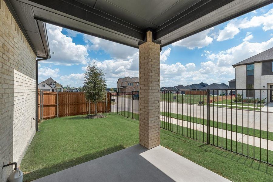 Exterior details and patio area of a home in Cottages of Celina, Celina (Image 22).