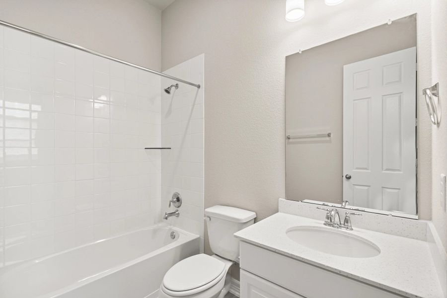 Furnished interior view inside a new home in Sunterra Lakes, Brookshire (Image 10).