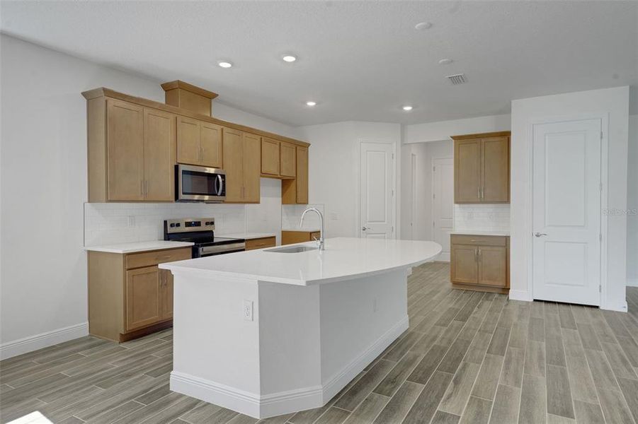 Furnished interior view inside a new home in Angeline, Land O' Lakes (Image 11).