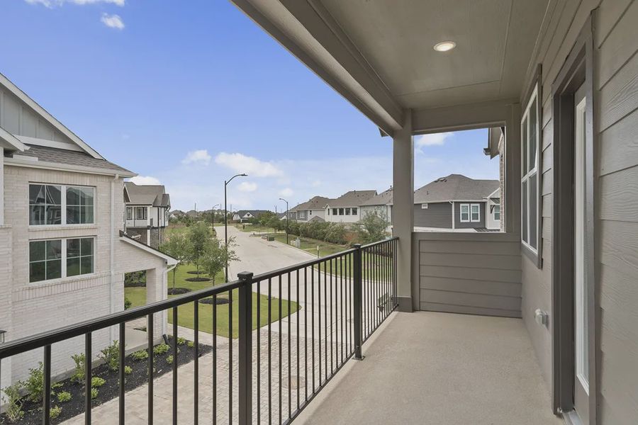 Exterior details and patio area of a home in Elyson Courtyard Collection, Katy (Image 3).