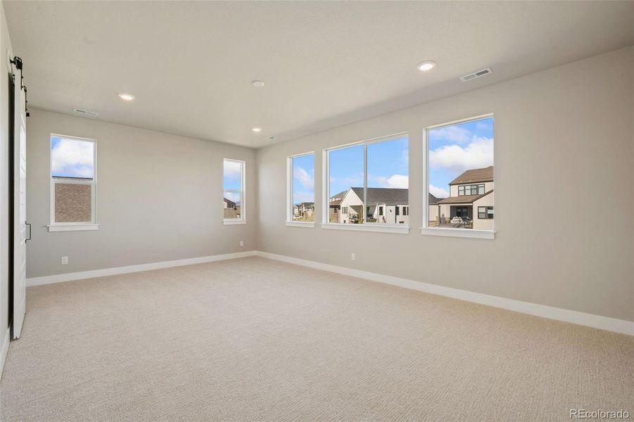 Spacious, unfurnished interior of a new home in Kitchel Lake at Serratoga Falls, Timnath (Image 8).