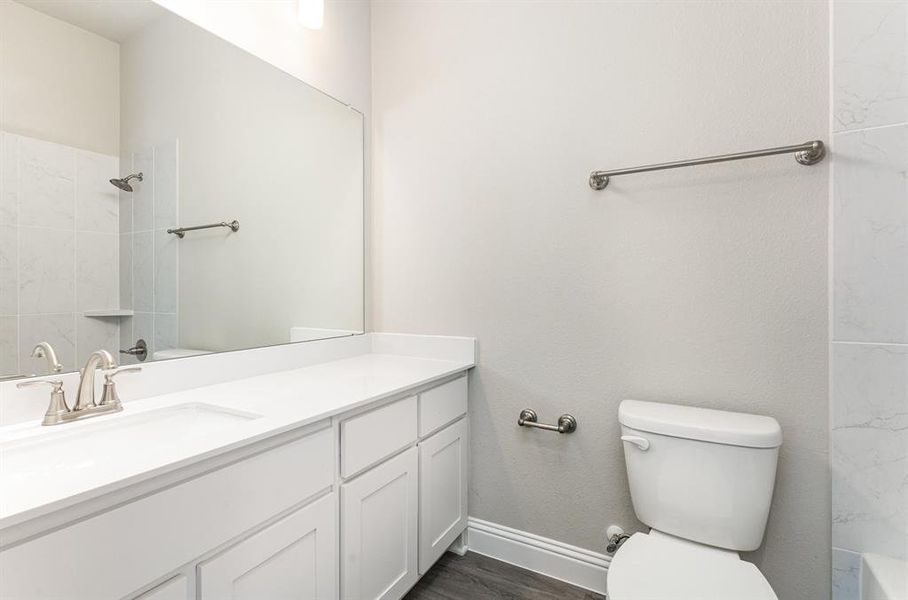 Furnished interior view inside a new home in Ten Mile Creek Estates, DeSoto (Image 14).