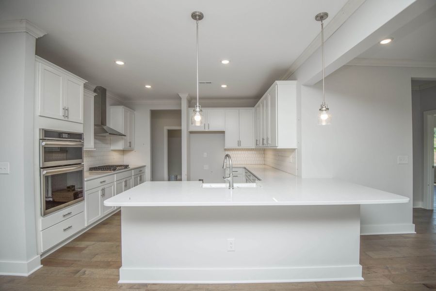 *Photo of example home. Selections and Finishes May Vary.* *Photo of example home. Selections and Finishes May Vary.*