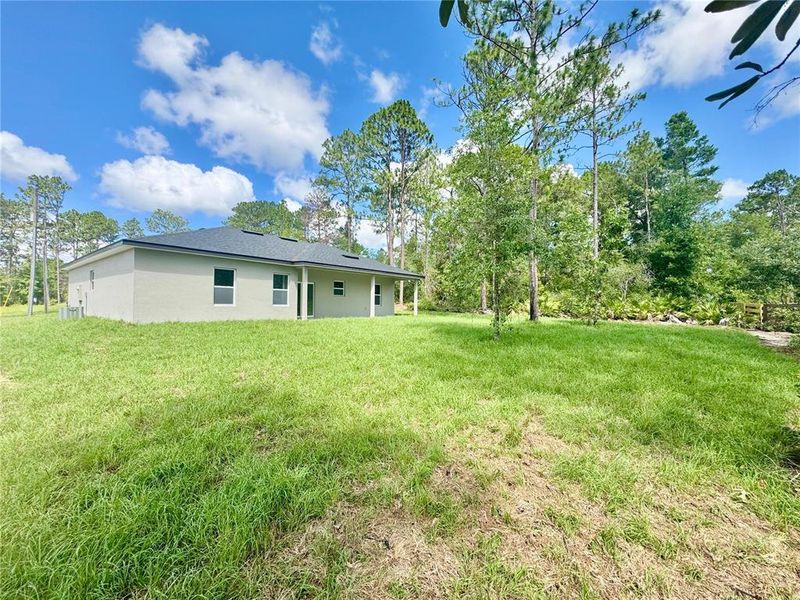 Exterior details and patio area of a home in , Citrus Springs (Image 23).