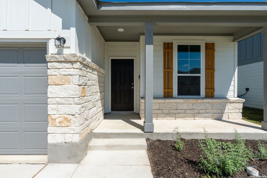 Exterior details and patio area of a home in The Overlook at Creekside, New Braunfels (Image 3).