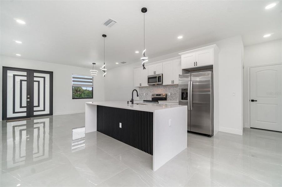 Furnished interior view inside a new home in , Port Charlotte (Image 7). Furnished interior view inside a new home in , Port Charlotte (Image 7).