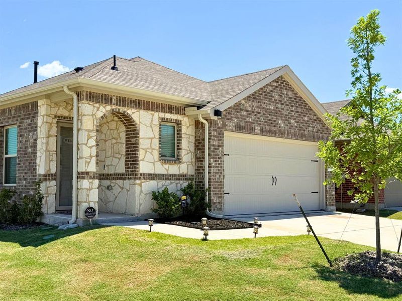 Front exterior of a new home in , Crandall, TX, highlighting curb appeal (Image 23).