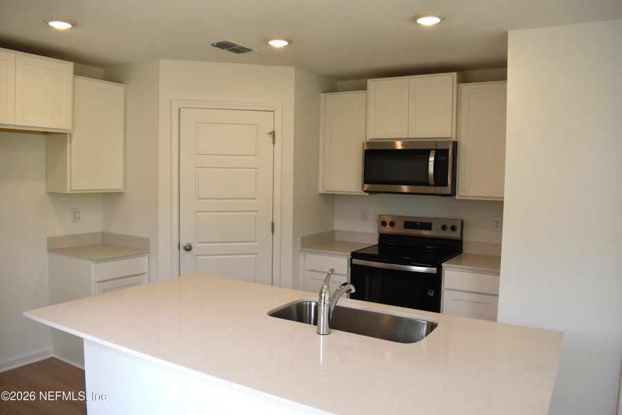 Furnished interior view inside a new home in Irongate Villas, Jacksonville (Image 14).