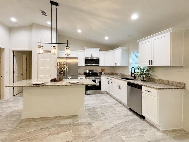 Furnished interior view inside a new home in , Dunnellon (Image 8).