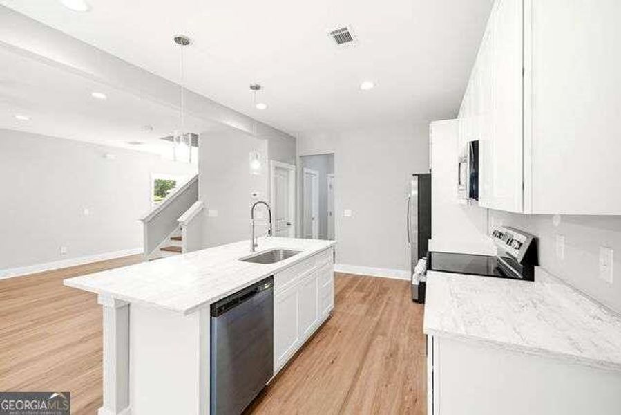 Furnished interior view inside a new home in , Mount Airy (Image 9).